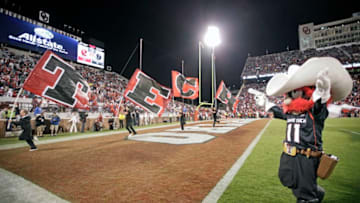 NORMAN, OK - OCTOBER 22: The Texas Tech spirit squad celebrates a touchdown in the second half against the Oklahoma Sooners October 22, 2011 at Gaylord Family-Oklahoma Memorial Stadium in Norman, Oklahoma. Texas Tech upset Oklahoma 41-38. (Photo by Brett Deering/Getty Images)
