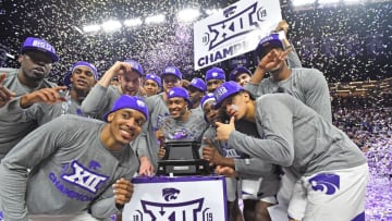 MANHATTAN, KS - MARCH 09: Players of the Kansas State Wildcats celebrate after wining the Big 12 Regular Season Championship on March 9, 2019 at Bramlage Coliseum in Manhattan, Kansas. (Photo by Peter G. Aiken/Getty Images)
