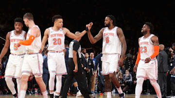 NEW YORK, NY - FEBRUARY 3: Kevin Knox #20 of the New York Knicks high-fives DeAndre Jordan #6 of the New York Knicks against the Memphis Grizzlies on February 3, 2019 at Madison Square Garden in New York City, New York. NOTE TO USER: User expressly acknowledges and agrees that, by downloading and or using this photograph, User is consenting to the terms and conditions of the Getty Images License Agreement. Mandatory Copyright Notice: Copyright 2019 NBAE (Photo by Nathaniel S. Butler/NBAE via Getty Images)