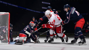 COLUMBUS, OH - OCTOBER 30: Scott Harrington #4 of the Columbus Blue Jackets defends as Sergei Bobrovsky #72 stops a shot from Darren Helm #43 of the Detroit Red Wings during the second period on October 30, 2018 at Nationwide Arena in Columbus, Ohio. (Photo by Jamie Sabau/NHLI via Getty Images)