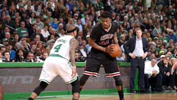 BOSTON, MA - APRIL 26: Jimmy Butler #21 of the Chicago Bulls handles the ball against the Boston Celtics during Game Five of the Eastern Conference Quarterfinals of the 2017 NBA Playoffs on April 26, 2017 at TD Garden in Boston, MA. NOTE TO USER: User expressly acknowledges and agrees that, by downloading and or using this Photograph, user is consenting to the terms and conditions of the Getty Images License Agreement. Mandatory Copyright Notice: Copyright 2017 NBAE (Photo by Brian Babineau/NBAE via Getty Images)