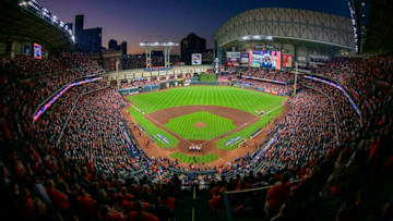Oct 27, 2021; Houston, Texas, USA; A view of the ballpark and the field and the sunset during the playing of the national anthem before the game between the Houston Astros and the Atlanta Braves during game two of the 2021 World Series at Minute Maid Park. Mandatory Credit: Jerome Miron-USA TODAY Sports