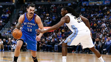 Apr 5, 2016; Denver, CO, USA; Denver Nuggets forward Kenneth Faried (35) guards Oklahoma City Thunder center Steven Adams (12) in the third quarter at the Pepsi Center. The Thunder defeated the Nuggets 124-102. Mandatory Credit: Isaiah J. Downing-USA TODAY Sports