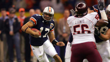 Jason Campbell and the 2004 Auburn football team finished 13-0, but didn't play for the BCS title. (Photo by Matthew Stockman/Getty Images)