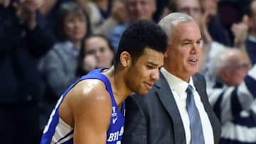 LAS VEGAS, NV - MARCH 05: Yoeli Childs #23 of the Brigham Young Cougars talks with head coach Dave Rose as Childs comes out of the team's semifinal game of the West Coast Conference basketball tournament after scoring a career-high 33 points against the Saint Mary's Gaels at the Orleans Arena on March 5, 2018 in Las Vegas, Nevada. The Cougars won 85-72. (Photo by Ethan Miller/Getty Images)