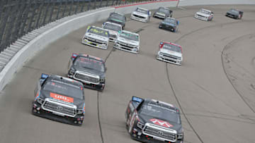 NEWTON, IOWA - JUNE 16: Todd Gilliland, driver of the #4 JBL/SiriusXM Toyota, and Harrison Burton, driver of the #18 Morton Buildings Toyota, lead a pack of trucks during the NASCAR Gander Outdoor Truck Series M&M's 200 Presented by Casey's General Store at Iowa Speedway on June 16, 2019 in Newton, Iowa. (Photo by Matt Sullivan/Getty Images)