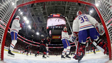 RALEIGH, NC - DECEMBER 31: Sebastian Aho #20 of the Carolina Hurricanes (not pictured) bats a puck out of the air and scores past goaltender Charlie Lindgren #39 of the Montreal Canadiens during an NHL game on December 31, 2019 at PNC Arena in Raleigh, North Carolina. (Photo by Gregg Forwerck/NHLI via Getty Images)