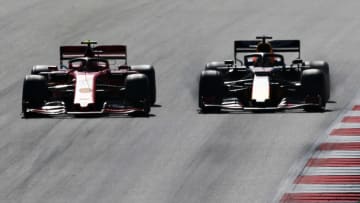 SPIELBERG, AUSTRIA - JUNE 30: Max Verstappen of the Netherlands driving the (33) Aston Martin Red Bull Racing RB15 and Charles Leclerc of Monaco driving the (16) Scuderia Ferrari SF90 battle for position during the F1 Grand Prix of Austria at Red Bull Ring on June 30, 2019 in Spielberg, Austria. (Photo by Charles Coates/Getty Images)