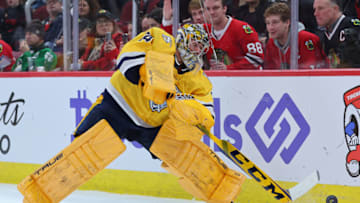 Juuse Saros #74 of the Nashville Predators tends the net during the second period against the Chicago Blackhawks at United Center on December 21, 2022 in Chicago, Illinois. (Photo by Michael Reaves/Getty Images)