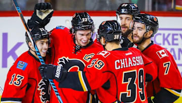 Oct 28, 2016; Calgary, Alberta, CAN; Calgary Flames center Sean Monahan (23) celebrates his goal with teammates against Ottawa Senators during the third period at Scotiabank Saddledome. Calgary Flames won 5-2. Mandatory Credit: Sergei Belski-USA TODAY Sports