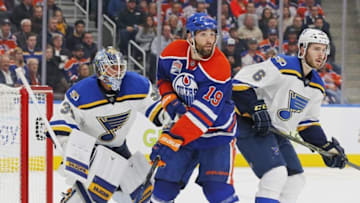 Oct 20, 2016; Edmonton, Alberta, CAN; Edmonton Oilers forward Patrick Maroon (19) battles with St. Louis Blues defensemen Joel Edmundson (6) while trying to screen goaltender Jake Allen (34) during the third period at Rogers Place. Mandatory Credit: Perry Nelson-USA TODAY Sports