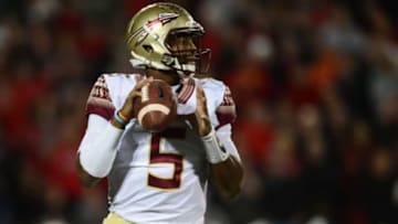Oct 30, 2014; Louisville, KY, USA; Florida State Seminoles quarterback Jameis Winston (5) against the Louisville Cardinals at Papa John