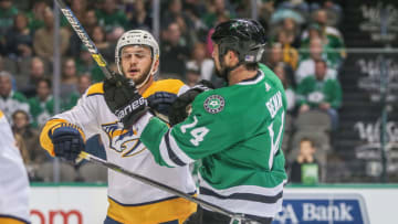 DALLAS, TX - NOVEMBER 10: Dallas Stars Left Wing Jamie Benn (14) tangles with Nashville Predators Defenseman Mattias Ekholm (14) during the game between the Dallas Stars and Nashville Predators on November 10, 2018 at the American Airlines Center in Dallas, TX. (Photo by George Walker/Icon Sportswire via Getty Images)