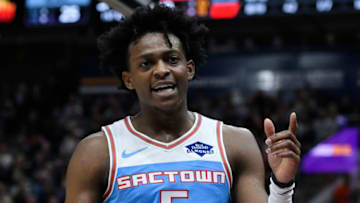 SALT LAKE CITY, UT - NOVEMBER 21: De'Aaron Fox #5 of the Sacramento Kings gestures after a foul called against the Utah Jazz in the first half of a NBA game at Vivint Smart Home Arena on November 21, 2018 in Salt Lake City, Utah. (Photo by Gene Sweeney Jr./Getty Images)