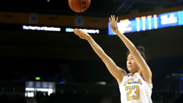 LOS ANGELES, CALIFORNIA - MARCH 01: Natalie Chou #23 of the UCLA Bruins shoots a three-pointer during the third quarter against the Utah Utes at Pauley Pavilion on March 01, 2020 in Los Angeles, California. (Photo by Katharine Lotze/Getty Images)