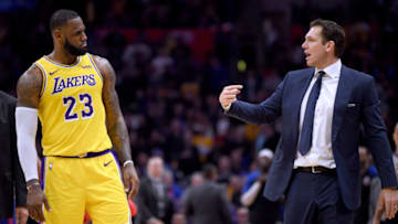 LOS ANGELES, CALIFORNIA - JANUARY 31: LeBron James #23 of the Los Angeles Lakers and Luke Walton talk during a timeout during a 123-120 win over the LA Clippers at Staples Center on January 31, 2019 in Los Angeles, California. NOTE TO USER: User expressly acknowledges and agrees that, by downloading and or using this photograph, User is consenting to the terms and conditions of the Getty Images License Agreement. (Photo by Harry How/Getty Images)