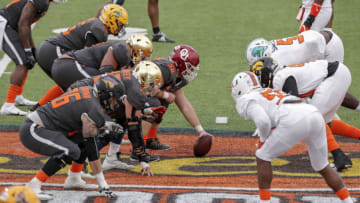 MOBILE, AL - JANUARY 30: A general view of the National Team at the line of scrimmage facing off against the American Team during the 2021 Resse's Senior Bowl at Hancock Whitney Stadium on the campus of the University of South Alabama on January 30, 2021 in Mobile, Alabama. The National Team defeated the American Team 27-24. (Photo by Don Juan Moore/Getty Images)