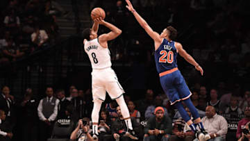 NEW YORK, NY - OCTOBER 03: Spencer Dinwiddie #8 of the Brooklyn Nets shoots the ball against Kevin Knox #20 of the New York Knicks during the preseason game at Barclays Center on October 3, 2018 in the Brooklyn borough of New York City. NOTE TO USER: User expressly acknowledges and agrees that, by downloading and or using this photograph, User is consenting to the terms and conditions of the Getty Images License Agreement. (Photo by Matteo Marchi/Getty Images)