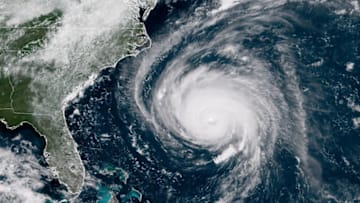 IN SPACE - SEPTEMBER 12: In this satellite image provided by U.S. National Oceanic and Atmospheric Administration (NOAA), Hurricane Florence churns through the Atlantic Ocean toward the U.S. East Coast on September 12, 2018. Florence slowed its approach to the U.S. today and was forecast to turn south, stalling along the North Carolina and South Carolina coast and bringing with it torrential rain, high winds and a dangerous storm surge tomorrow through Saturday. (Photo by NOAA via Getty Images)