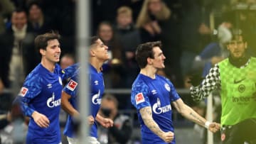 GELSENKIRCHEN, GERMANY - DECEMBER 15: Benito Raman of FC Schalke celebrates with teammates after scoring his team's first goal during the Bundesliga match between FC Schalke 04 and Eintracht Frankfurt at Veltins-Arena on December 15, 2019 in Gelsenkirchen, Germany. (Photo by Lars Baron/Bongarts/Getty Images)