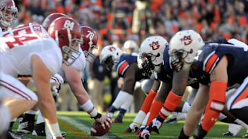 Auburn footballNov 30, 2013; Auburn, AL, USA; Alabama Crimson Tide offensive linesman Chad Lindsay (78) prepares to snap the ball at the line of scrimmage against the Auburn Tigers at Jordan Hare Stadium. Mandatory Credit: RVR Photos-USA TODAY Sports