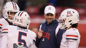 SALT LAKE CITY UT- NOVEMBER 5: Jimmy Dougherty assistant coach of the Arizona Wildcats watches during warm ups before their game against the Utah Utes at Rice Eccles Stadium November 5, 2022 in Salt Lake City Utah. (Photo by Chris Gardner/ Getty Images)
