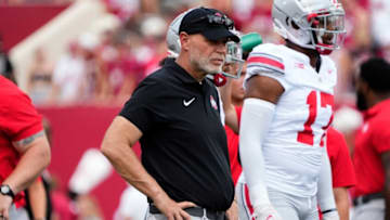 Sep 2, 2023; Bloomington, Indiana, USA; Ohio State Buckeyes defensive coordinator Jim Knowles watches warm ups prior to the NCAA football game at Indiana University Memorial Stadium. Ohio State won 23-3.