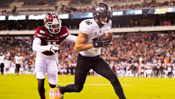 PHILADELPHIA, PA - OCTOBER 26: Tre Nixon #16 of the UCF Knights catches a touchdown pass against Linwood Crump #11 of the Temple Owls in the second quarter at Lincoln Financial Field on October 26, 2019 in Philadelphia, Pennsylvania. The UCF Knights defeated the Temple Owls 63-21. (Photo by Mitchell Leff/Getty Images)