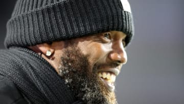 ORCHARD PARK, NEW YORK - DECEMBER 06: Randy Moss reacts prior to a game between the Buffalo Bills and the New England Patriots at Highmark Stadium on December 06, 2021 in Orchard Park, New York. (Photo by Bryan M. Bennett/Getty Images)