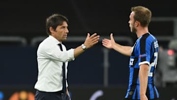 Inter Milan's Italian head coach Antonio Conte congratulates Inter Milan's Danish midfielder Christian Eriksen after the UEFA Europa League round of 16 football match Inter Milan v Getafe on August 5, 2020 in Gelsenkirchen, western Germany. - (Photo by Ina Fassbender / various sources / AFP) (Photo by INA FASSBENDER/POOL/AFP via Getty Images)
