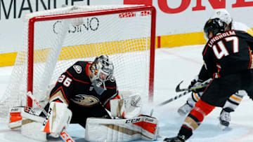 ANAHEIM, CA - JANUARY 17: John Gibson #36 of the Anaheim Ducks makes a save with help from Hampus Lindholm #47 during the game against the Pittsburgh Penguins on January 17, 2018 at Honda Center in Anaheim, California. (Photo by Debora Robinson/NHLI via Getty Images)