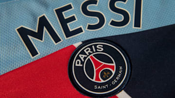 Lionel Messi on the back of a Manchester City home shirt with the Paris Saint-Germain club badge. (Photo by Visionhaus)