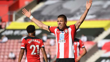 Southampton's Polish defender Jan Bednarek reacts during the English Premier League football match between Southampton and Arsenal at St Mary's Stadium in Southampton, southern England on June 25, 2020. (Photo by Mike Hewitt / POOL / AFP) / RESTRICTED TO EDITORIAL USE. No use with unauthorized audio, video, data, fixture lists, club/league logos or 'live' services. Online in-match use limited to 120 images. An additional 40 images may be used in extra time. No video emulation. Social media in-match use limited to 120 images. An additional 40 images may be used in extra time. No use in betting publications, games or single club/league/player publications. / (Photo by MIKE HEWITT/POOL/AFP via Getty Images)