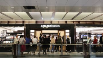 NEW YORK, NY - MAY 25: People enter the newly opened Amazon Books on May 25, 2017 in New York City. Amazon.com Inc.'s first New York City bookstore occupies 4,000 square feet in The Shops at Columbus Circle in Manhattan and stocks upwards of 3,000 books. Amazon Books, like the Amazon Go store, does not accept cash and instead lets Prime members use the Amazon app on their smartphone to pay for purchases. Non-members can use a credit or debit card. (Photo by Spencer Platt/Getty Images)