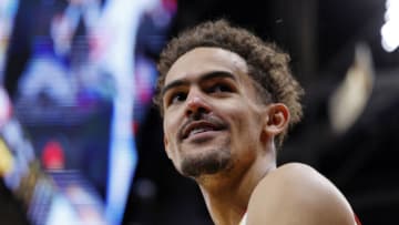 CLEVELAND, OHIO - APRIL 15: Trae Young #11 of the Atlanta Hawks reacts during the second half against the Cleveland Cavaliers at Rocket Mortgage Fieldhouse on April 15, 2022 in Cleveland, Ohio. NOTE TO USER: User expressly acknowledges and agrees that, by downloading and or using this photograph, User is consenting to the terms and conditions of the Getty Images License Agreement. (Photo by Rick Osentoski/Getty Images)