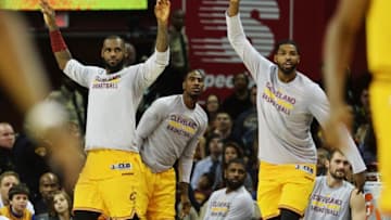 Nov 25, 2016; Cleveland, OH, USA; Cleveland Cavaliers forward LeBron James (23) and center Tristan Thompson (13) and guard Iman Shumpert (4) cheer from the bench during the fourth quarter against the Dallas Mavericks at Quicken Loans Arena. The Cavs won 128-90. Mandatory Credit: Ken Blaze-USA TODAY Sports