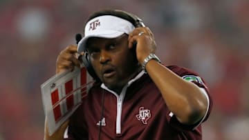 ARLINGTON, TX - SEPTEMBER 27: Head coach Kevin Sumlin of the Texas A&M Aggies reacts to a play as the Aggies take on the Arkansas Razorbacks in the second half of the Southwest Classic at AT&T Stadium on September 27, 2014 in Arlington, Texas. (Photo by Tom Pennington/Getty Images)