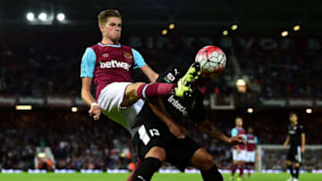 LONDON, ENGLAND - JULY 30: Reece Burke of West Ham (L) battles for the ball with Junior Morais of Astra Giurgiu during the UEFA Europa League third qualifying round match between West Ham United and Astra Giurgiu at the Boleyn Ground on July 30, 2015 in London, England. (Photo by Dan Mullan/Getty Images)