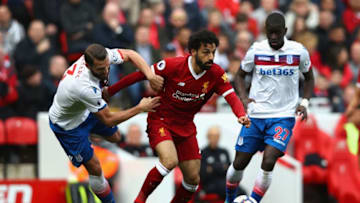 LIVERPOOL, ENGLAND - APRIL 28: Mohamed Salah of Liverpool goes past Erik Pieters of Stoke City during the Premier League match between Liverpool and Stoke City at Anfield on April 28, 2018 in Liverpool, England. (Photo by Clive Brunskill/Getty Images)
