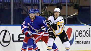 NEW YORK, NEW YORK - JANUARY 30: Alexis Lafreniere #13 of the New York Rangers skates against the Pittsburgh Penguins at Madison Square Garden on January 30, 2021 in New York City. (Photo by Bruce Bennett/Getty Images)