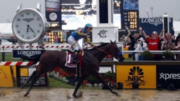 May 16, 2015; Baltimore, MD, USA; Victor Espinoza aboard American Pharoah wins the 140th Preakness Stakes at Pimlico Race Course. Mandatory Credit: Peter Casey-USA TODAY Sports