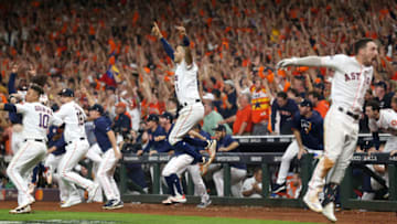 HOUSTON, TEXAS - OCTOBER 19: The Houston Astros celebrate their 6-4 win against the New York Yankees on a ninth inning walk-off home run by Jose Altuve (not pictured) in game six of the American League Championship Series at Minute Maid Park on October 19, 2019 in Houston, Texas. (Photo by Bob Levey/Getty Images)