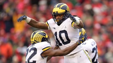 MADISON, WI - NOVEMBER 18: Devin Bush #10 of the Michigan Wolverines celebrates an interception against the Wisconsin Badgers at Camp Randall Stadium on November 18, 2017 in Madison, Wisconsin. Wisconsin defeated Michigan 24-10. (Photo by Stacy Revere/Getty Images)