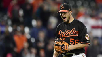 BALTIMORE, MD - APRIL 20: Darren O'Day #56 of the Baltimore Orioles celebrates after the Orioles defeated the Cleveland Indians 3-1 at Oriole Park at Camden Yards on April 20, 2018 in Baltimore, Maryland. (Photo by Patrick McDermott/Getty Images)