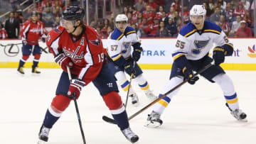 Oct 3, 2016; Washington, DC, USA; Washington Capitals center Nicklas Backstrom (19) skates with the puck as St. Louis Blues defenseman Colton Parayko (55) chases in the second period at Verizon Center. Mandatory Credit: Geoff Burke-USA TODAY Sports
