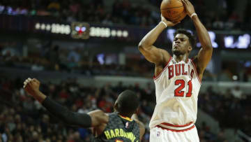 Mar 28, 2016; Chicago, IL, USA; Chicago Bulls guard Jimmy Butler (21) shoots against Atlanta Hawks guard Tim Hardaway Jr. (10) during the second half at United Center. Mandatory Credit: Kamil Krzaczynski-USA TODAY Sports