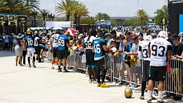 Jun 14, 2016; Jacksonville, FL, USA; Jacksonville Jaguars players sign autographs after minicamp workouts at Florida Blue Health and Wellness Practice Fields. Mandatory Credit: Logan Bowles-USA TODAY Sports