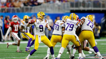 ATLANTA, GEORGIA - DECEMBER 28: Quarterback Joe Burrow #9 of the LSU Tigers delivers a pass against the defense of the Oklahoma Sooners during the Chick-fil-A Peach Bowl at Mercedes-Benz Stadium on December 28, 2019 in Atlanta, Georgia. (Photo by Mike Zarrilli/Getty Images)
