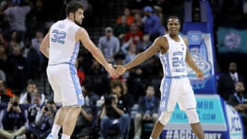 NEW YORK, NY - MARCH 07: Luke Maye #32 of the North Carolina Tar Heels and Kenny Williams #24 of the North Carolina Tar Heels dribble with the ball in the second half during the second round of the ACC Men's Basketball Tournament at Barclays Center on March 7, 2018 in New York City. (Photo by Abbie Parr/Getty Images)