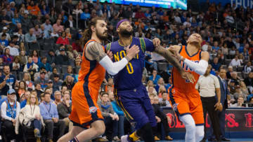 OKLAHOMA CITY, OK - FEBRUARY6: New Orleans Pelicans Center DeMarcus Cousins (0) Oklahoma City Thunder Center Steven Adams (12) Oklahoma City Thunder Guard Russell Westbrook (0) get in position for a rebound on February 26, 2017, at the Chesapeake Energy Arena Oklahoma City, OK. (Photo by Torrey Purvey/Icon Sportswire via Getty Images)